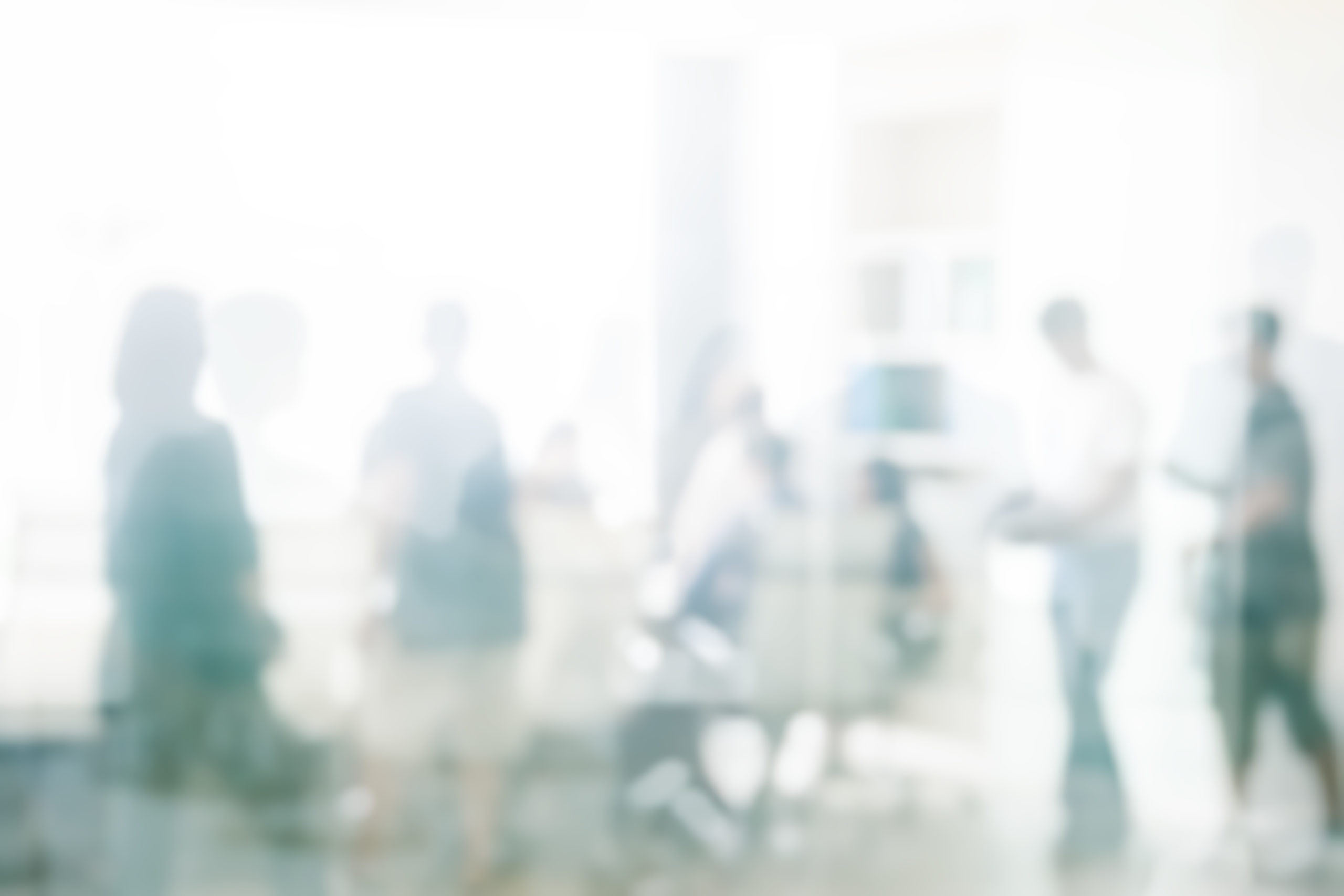 Blurred business people meeting in office interior